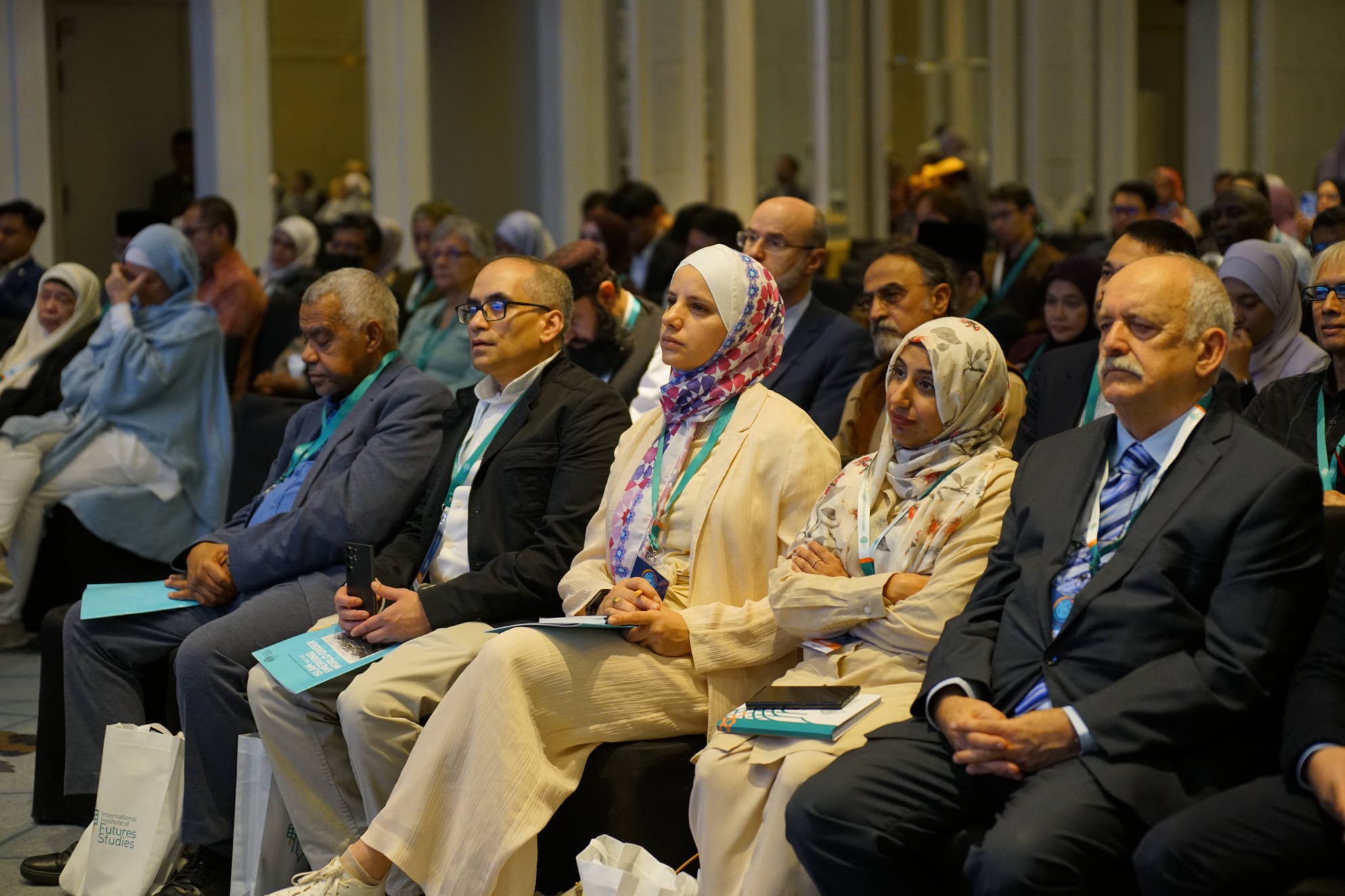 Audience listening at a conference