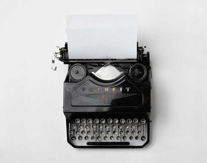 Vintage typewriter on a white desk